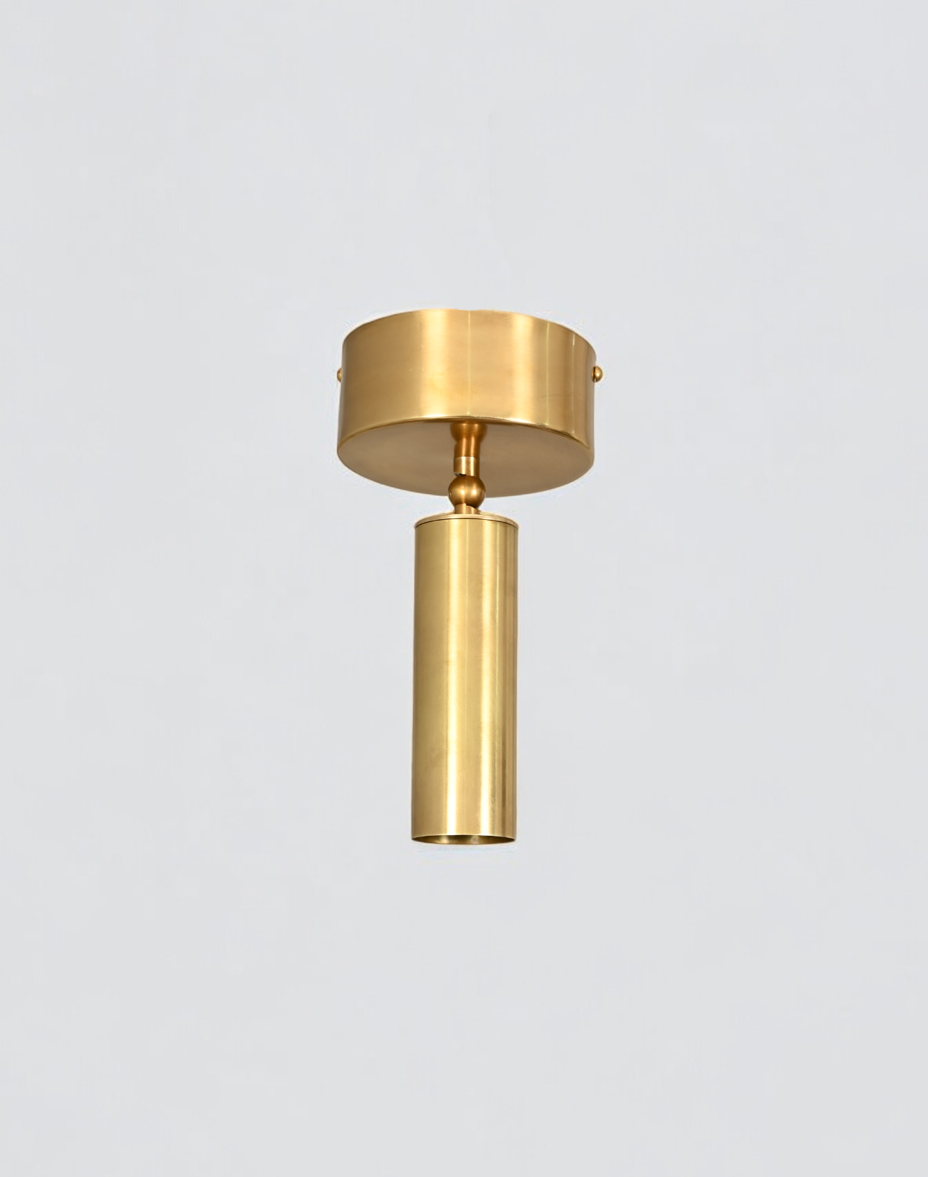 Elevate your space with our Cylinder Ceiling Light in antique brass, stylish and functional