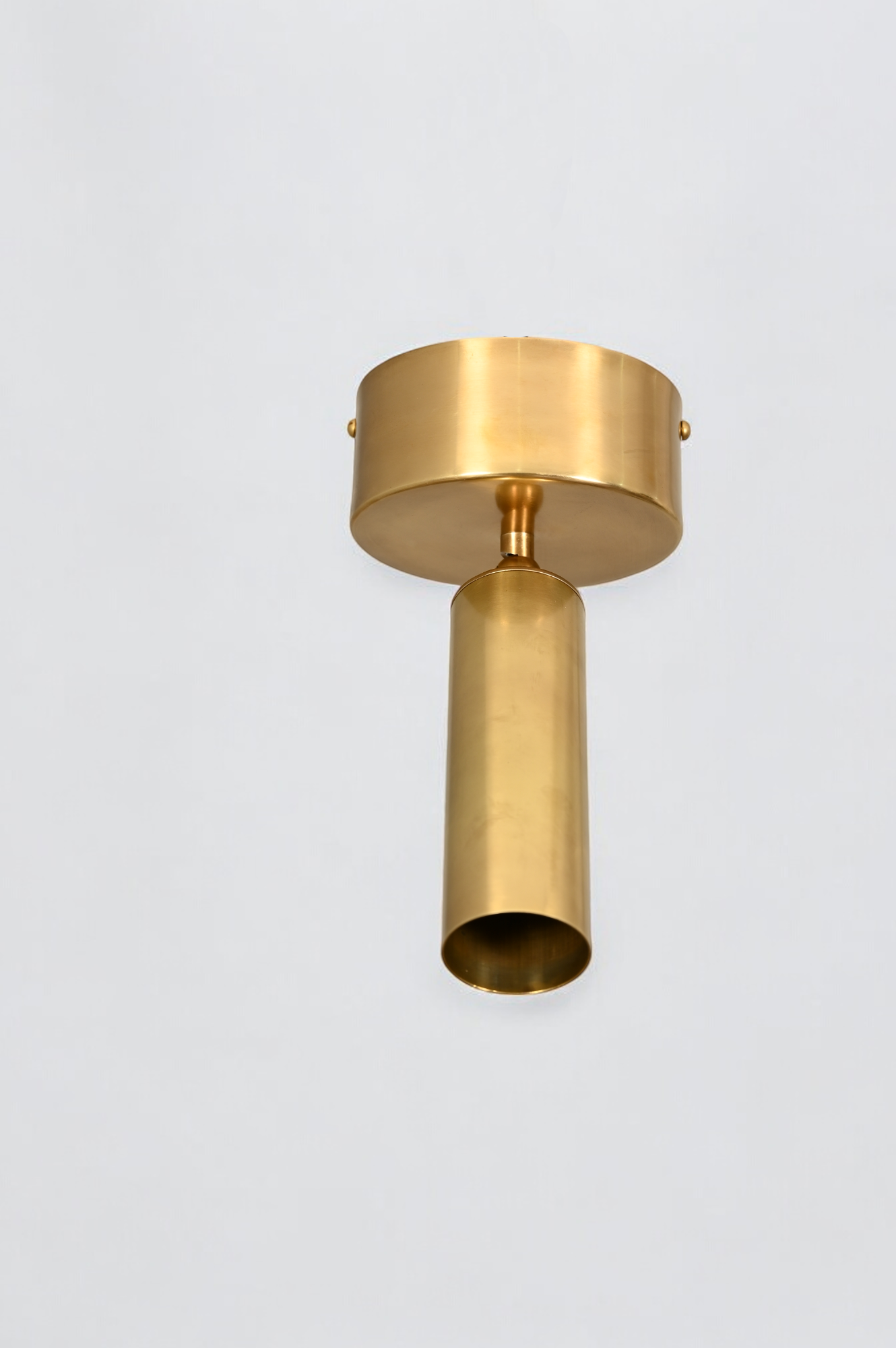 Elevate your space with our Cylinder Ceiling Light in antique brass, stylish and functional