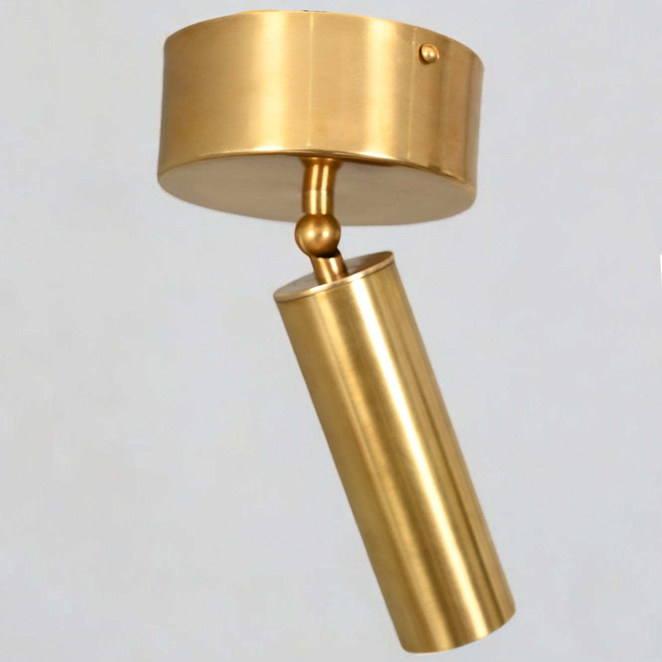 Elevate your space with our Cylinder Ceiling Light in antique brass, stylish and functional