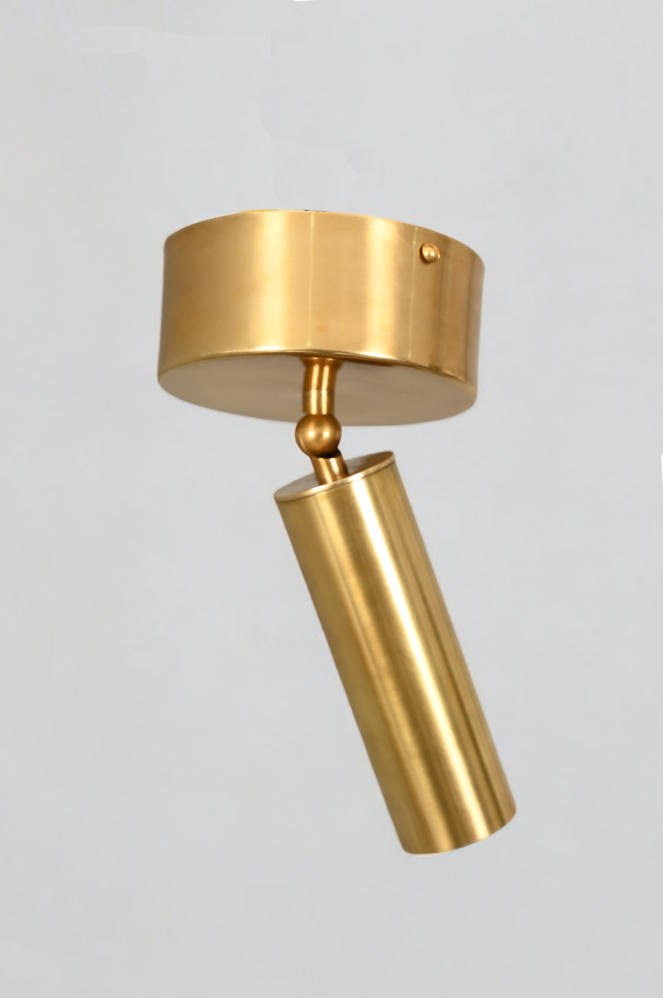 Elevate your space with our Cylinder Ceiling Light in antique brass, stylish and functional