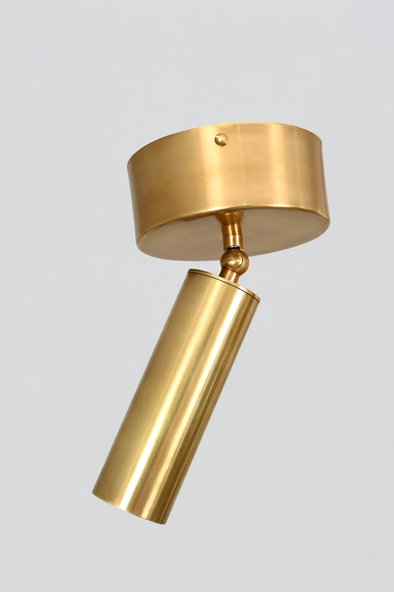 Elevate your space with our Cylinder Ceiling Light in antique brass, stylish and functional