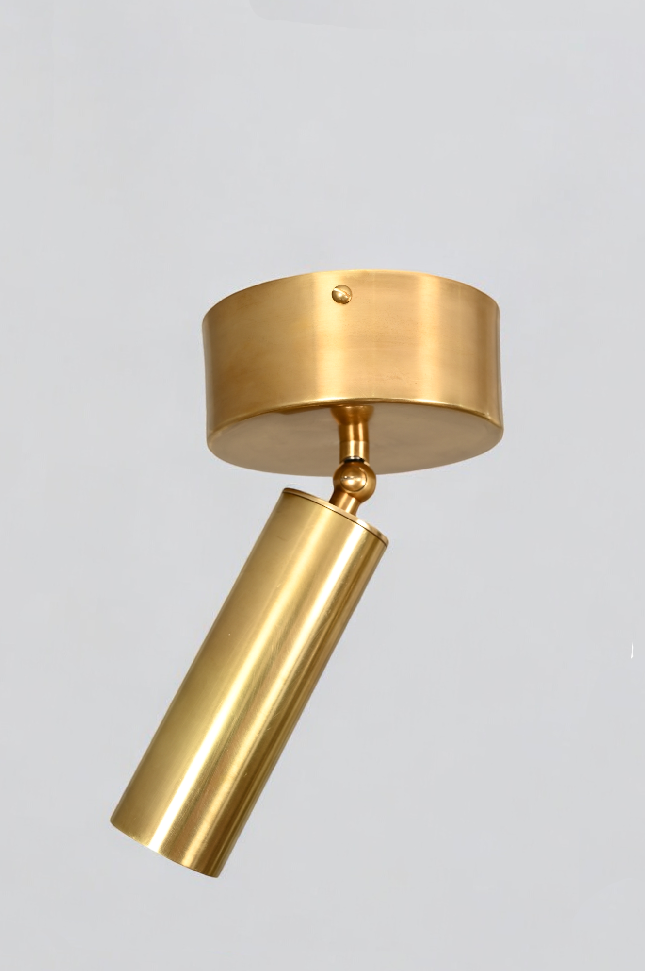 Elevate your space with our Cylinder Ceiling Light in antique brass, stylish and functional