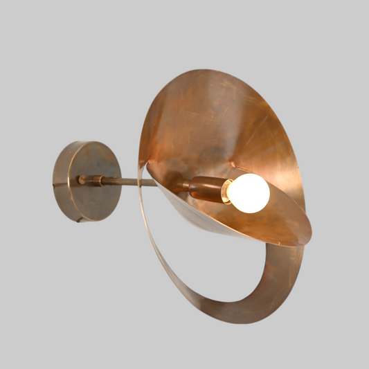 Serge Mouille Saturnus Wall Sconce: Iconic, sculptural mid-century lighting