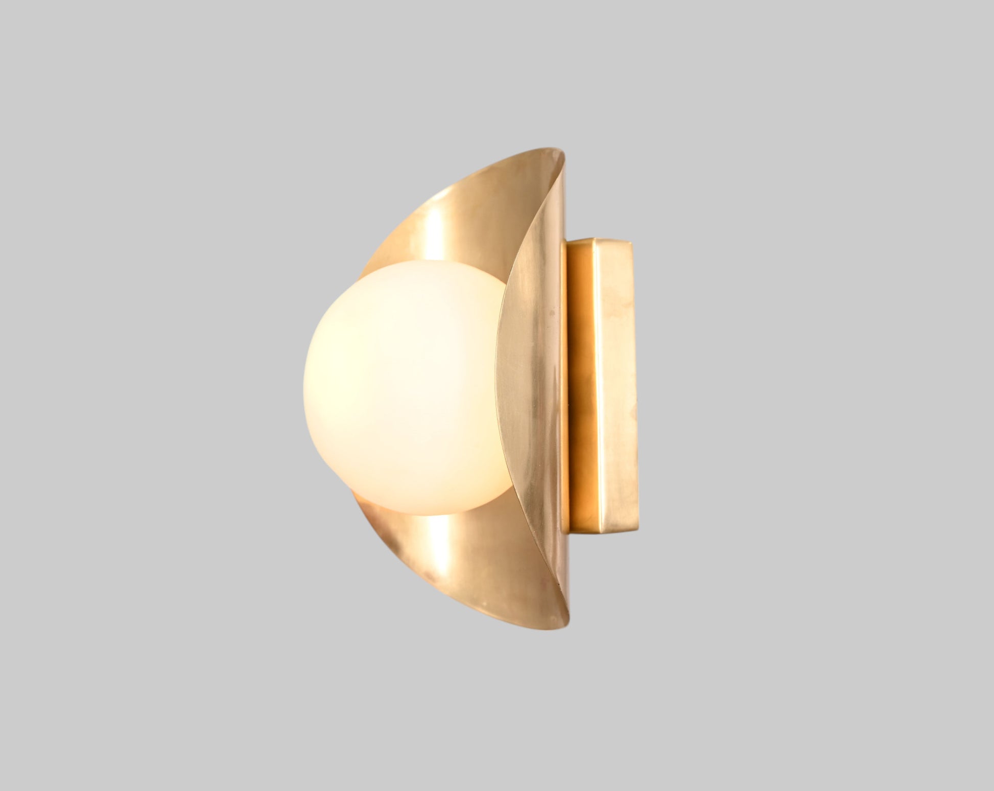 Mid Century Modern Raw Brass Sputnik Wall Sconces add stylish, retro elegance