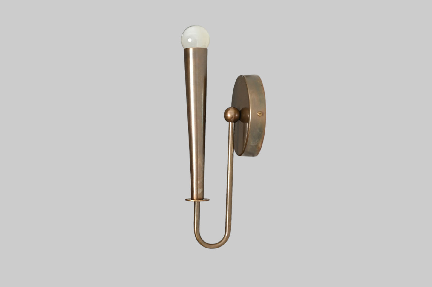 Mid-century modern wall sconces with raw brass finish and Sputnik design, timeless style