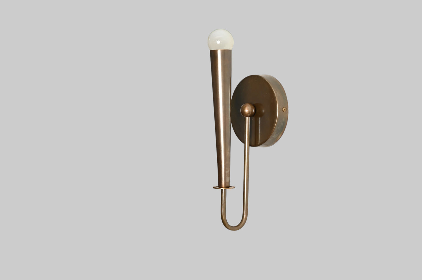 Mid-century modern wall sconces with raw brass finish and Sputnik design, timeless style