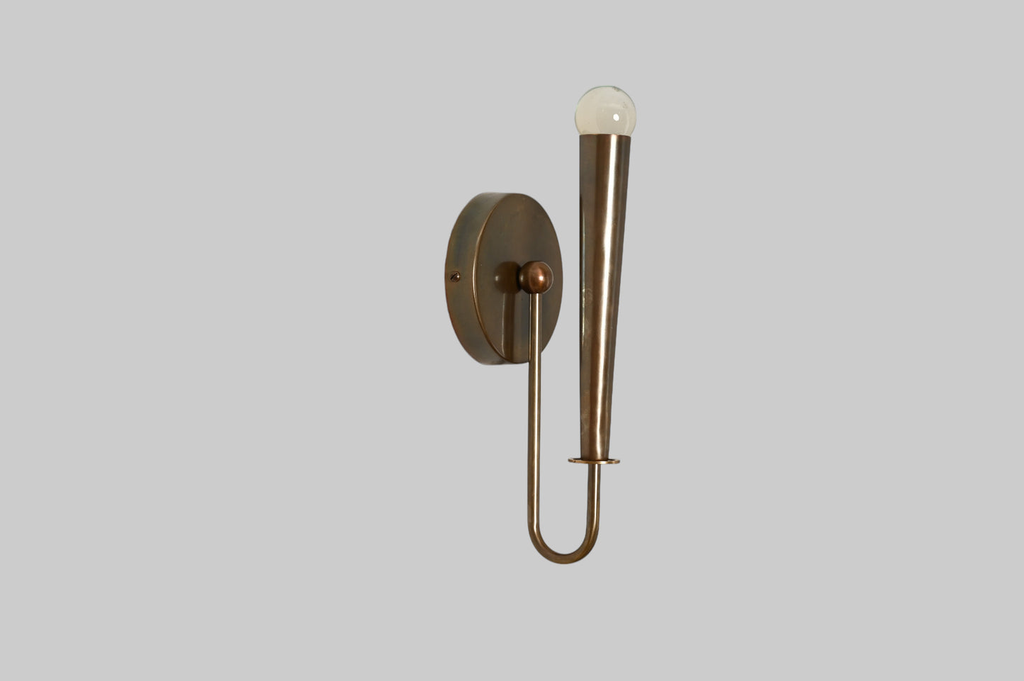 Mid-century modern wall sconces with raw brass finish and Sputnik design, timeless style