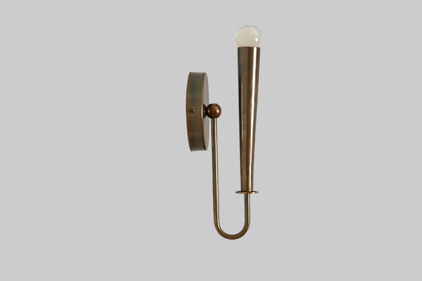 Mid-century modern wall sconces with raw brass finish and Sputnik design, timeless style