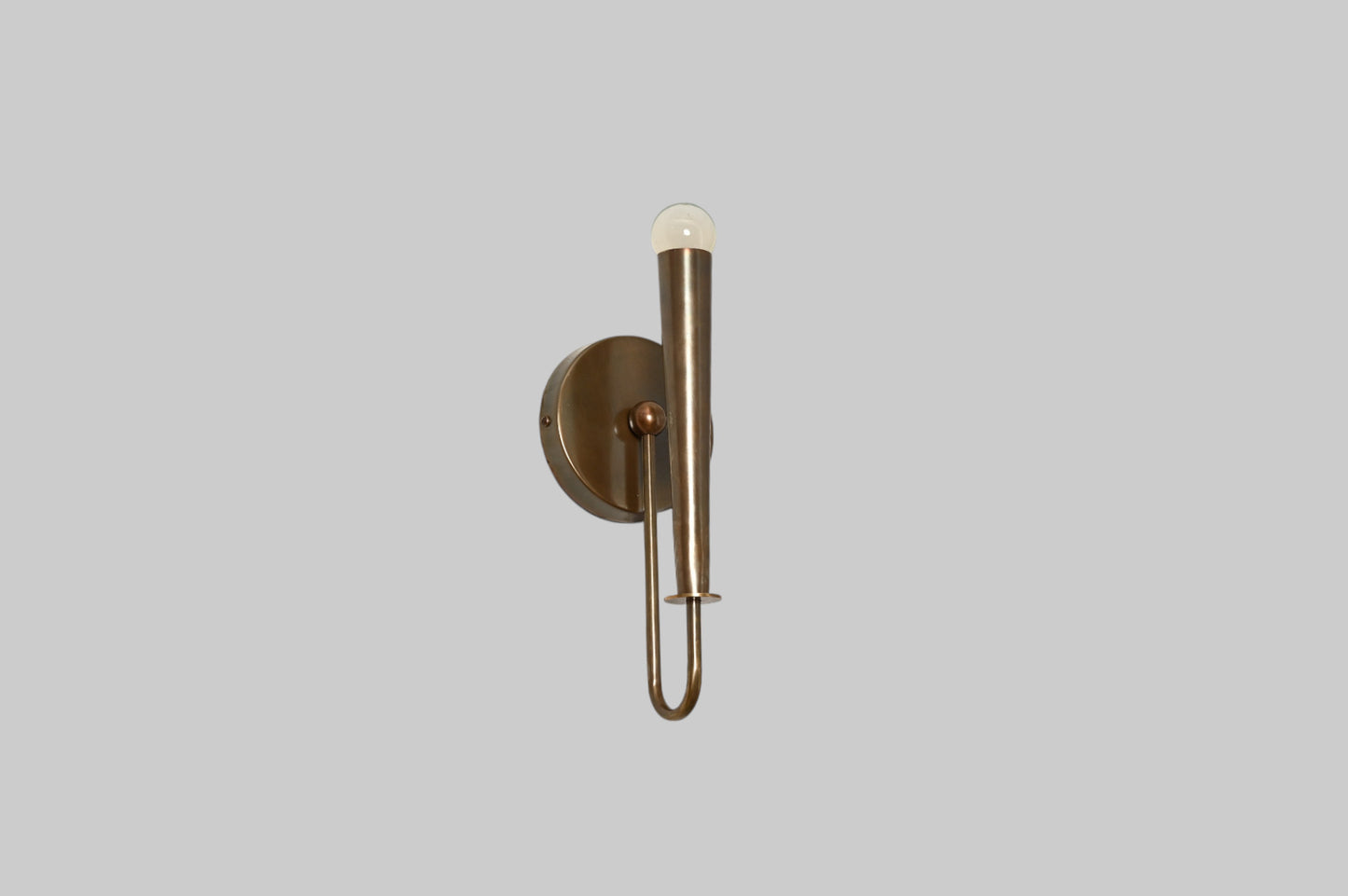 Mid-century modern wall sconces with raw brass finish and Sputnik design, timeless style