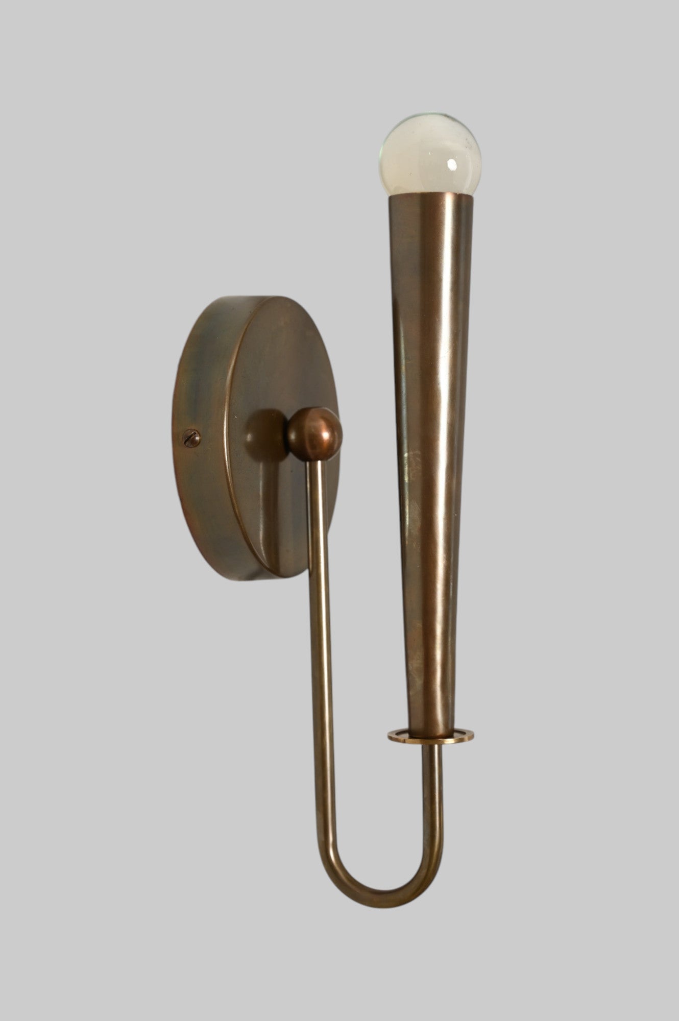 Mid-century modern wall sconces with raw brass finish and Sputnik design, timeless style