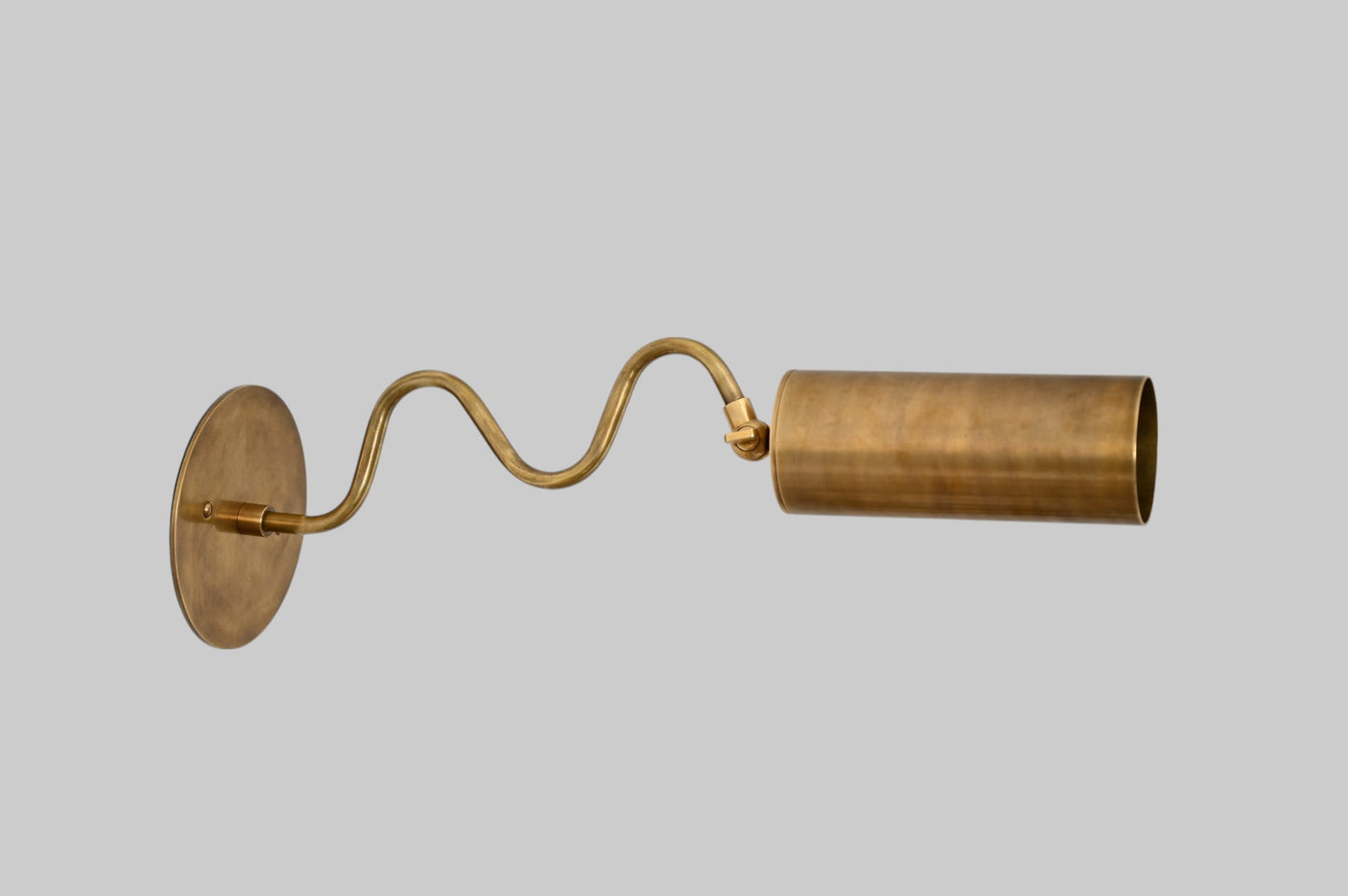 1-Light Italian ZigZag Sconce: Brass, sleek modern design, focused sculptural lighting