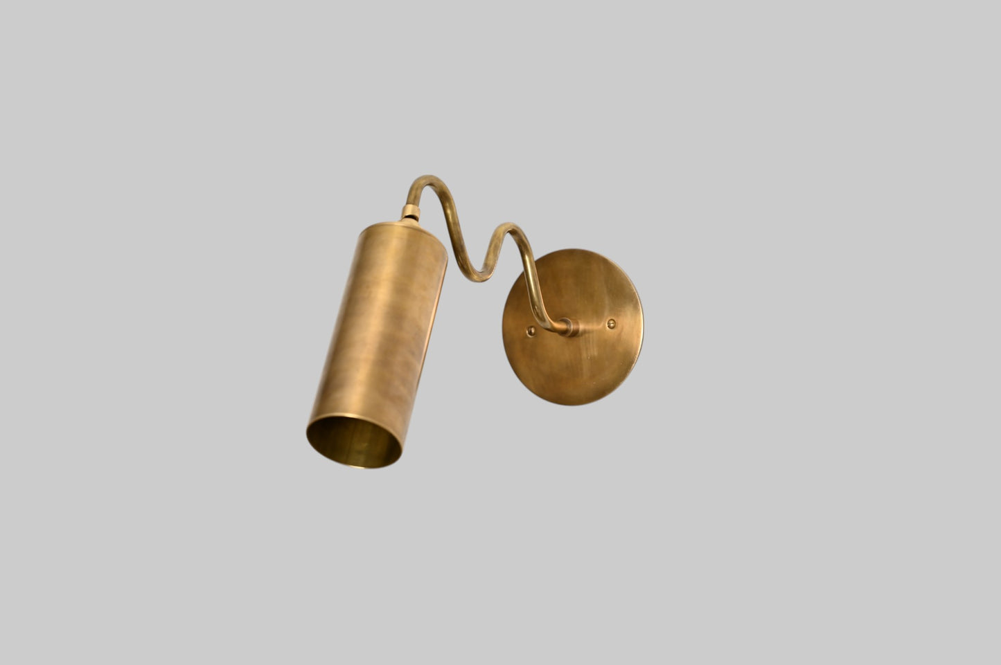 1-Light Italian ZigZag Sconce: Brass, sleek modern design, focused sculptural lighting