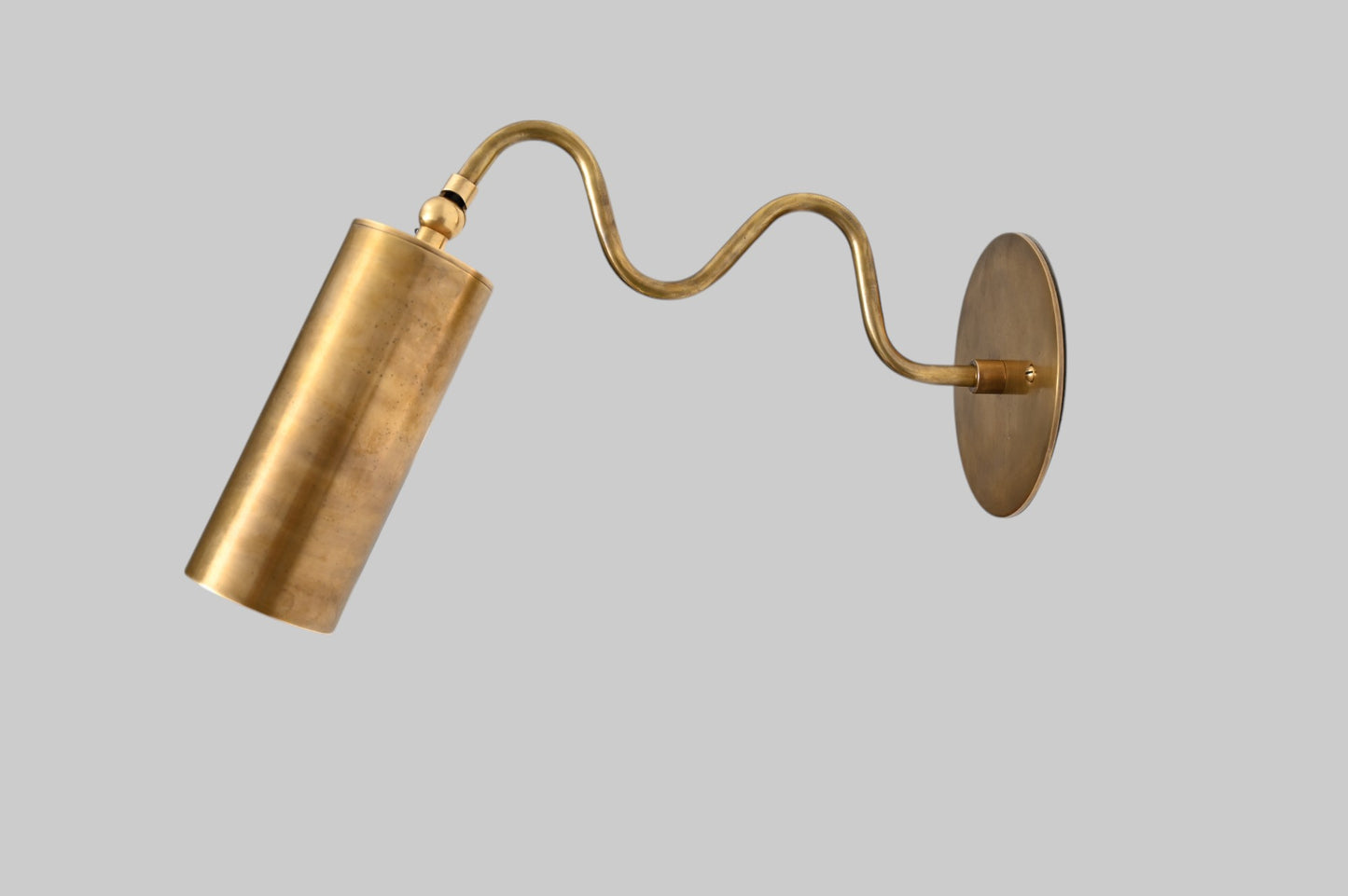 1-Light Italian ZigZag Sconce: Brass, sleek modern design, focused sculptural lighting